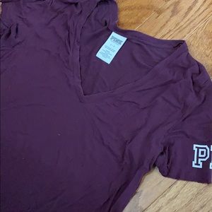 Maroon vs pink v neck tee shirt with logo sleeve